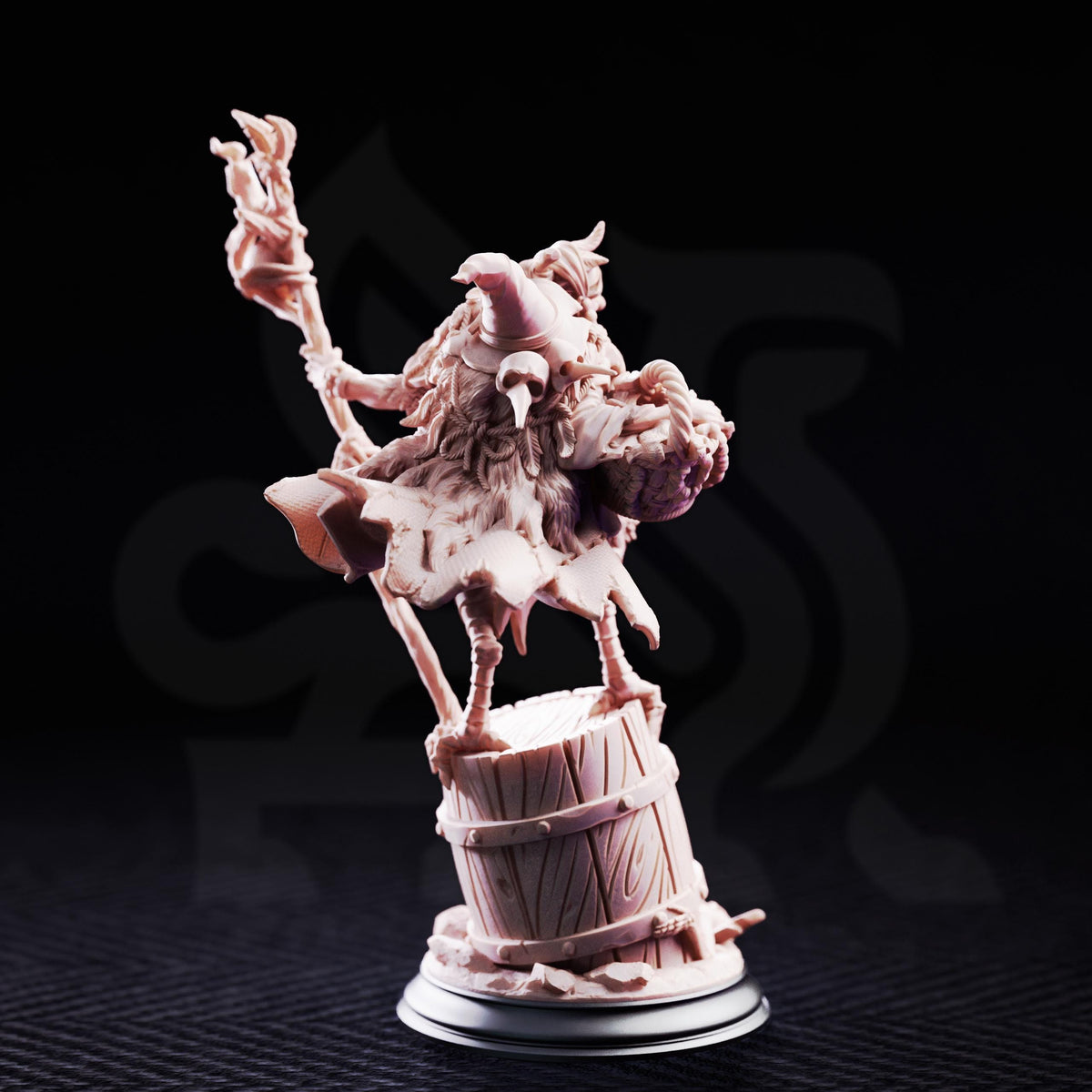 A detailed figurine of a fantastical creature, possibly a dragon or serpent, standing on a barrel and holding a staff.