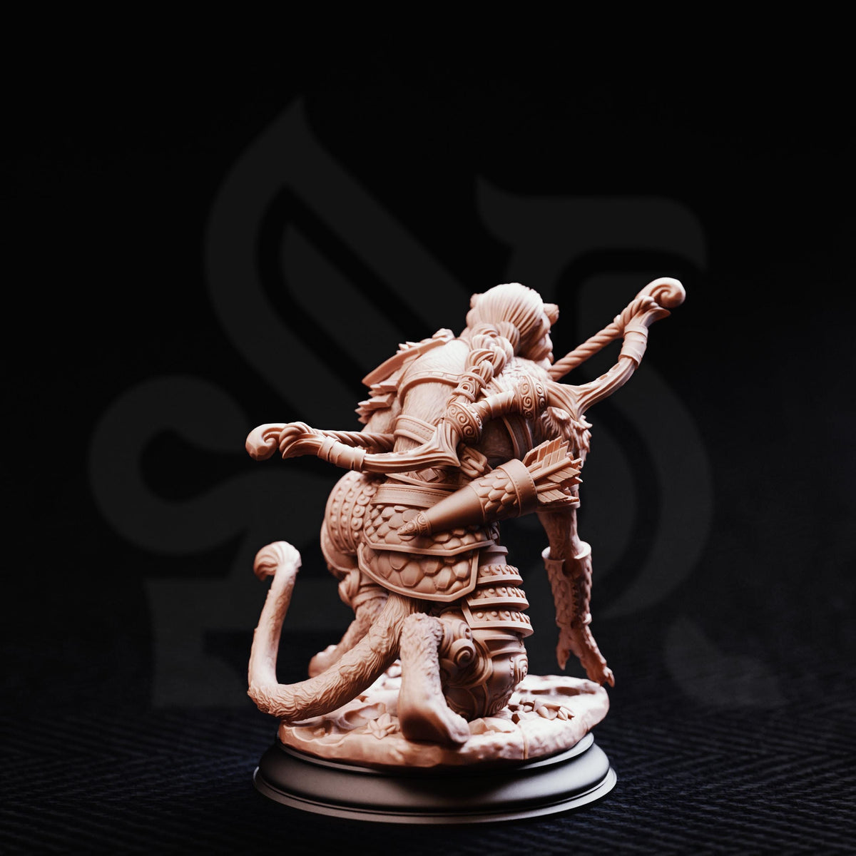 A detailed 3D model of a fantastical creature, possibly a dragon or serpent, with intricate armor and weapons, set against a dark background.
