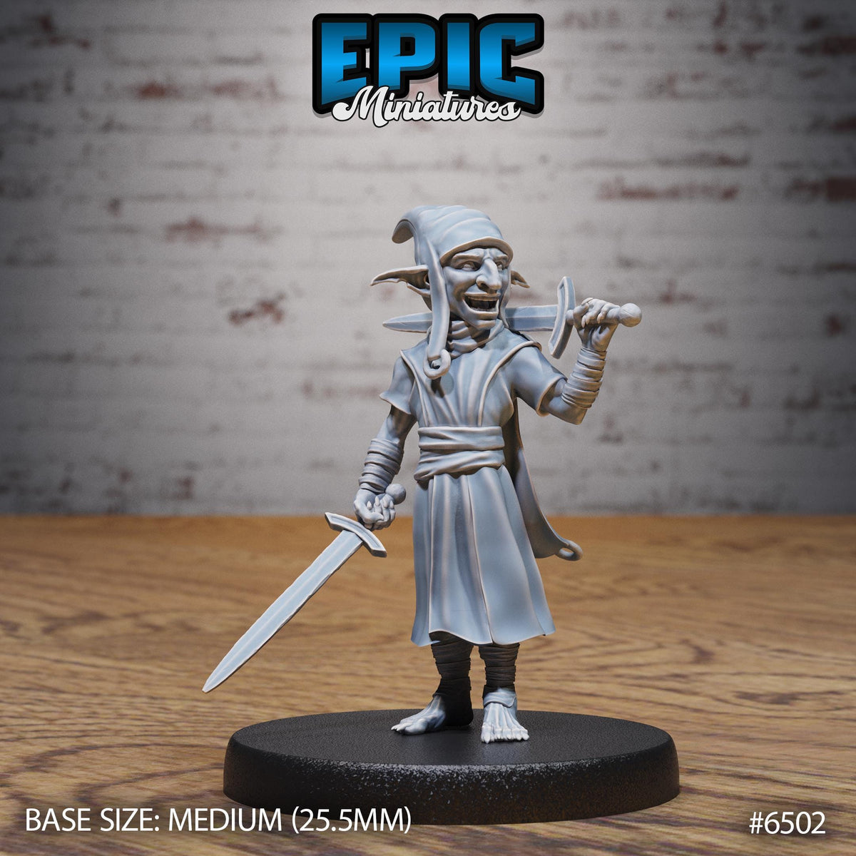 A figurine of a character with a pointed hat and a long beard, holding a sword and standing on a black base.