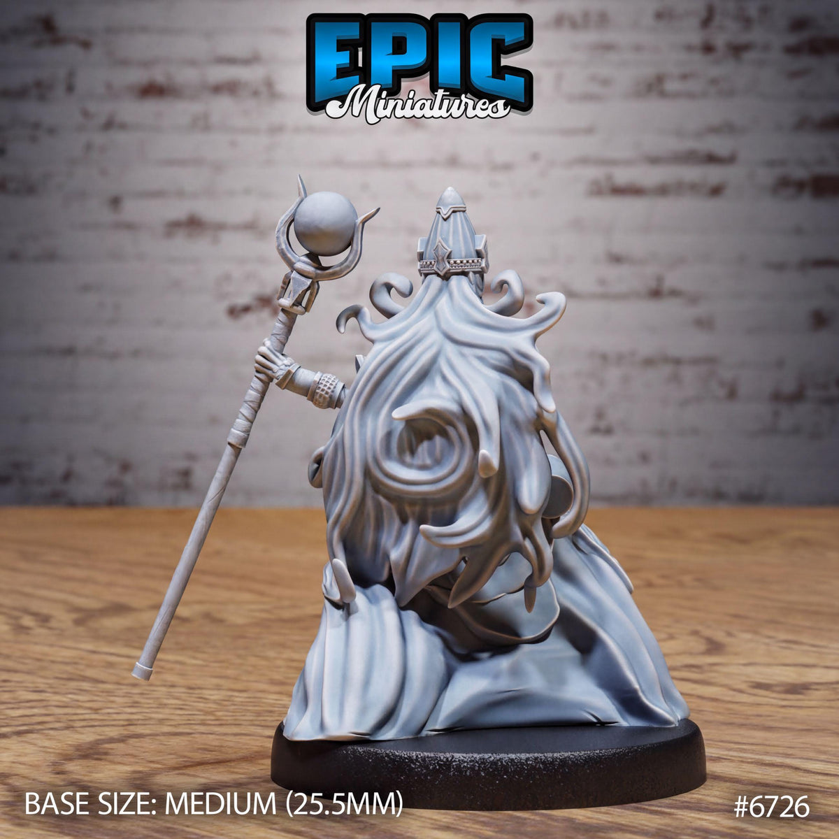 A 3D model of a character with a staff and a flowing robe, sitting on a wooden surface.