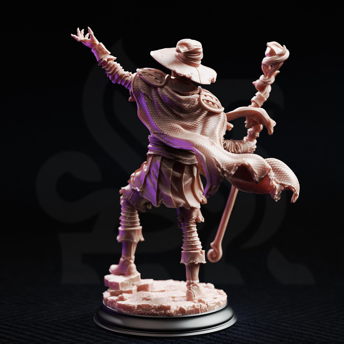 A figurine of a person in a robe and hat, holding a staff and appearing to be in a dynamic pose, is the main focus of the image.