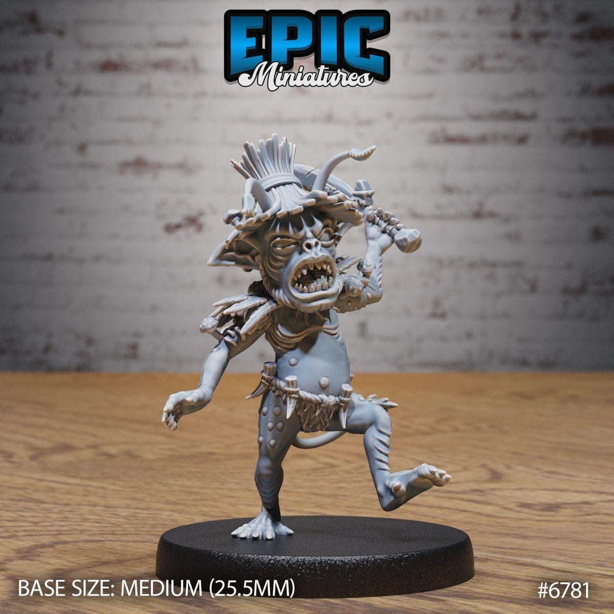 A figurine of a fantastical creature with a large head, sharp teeth, and a distinctive hat, standing on a black base.