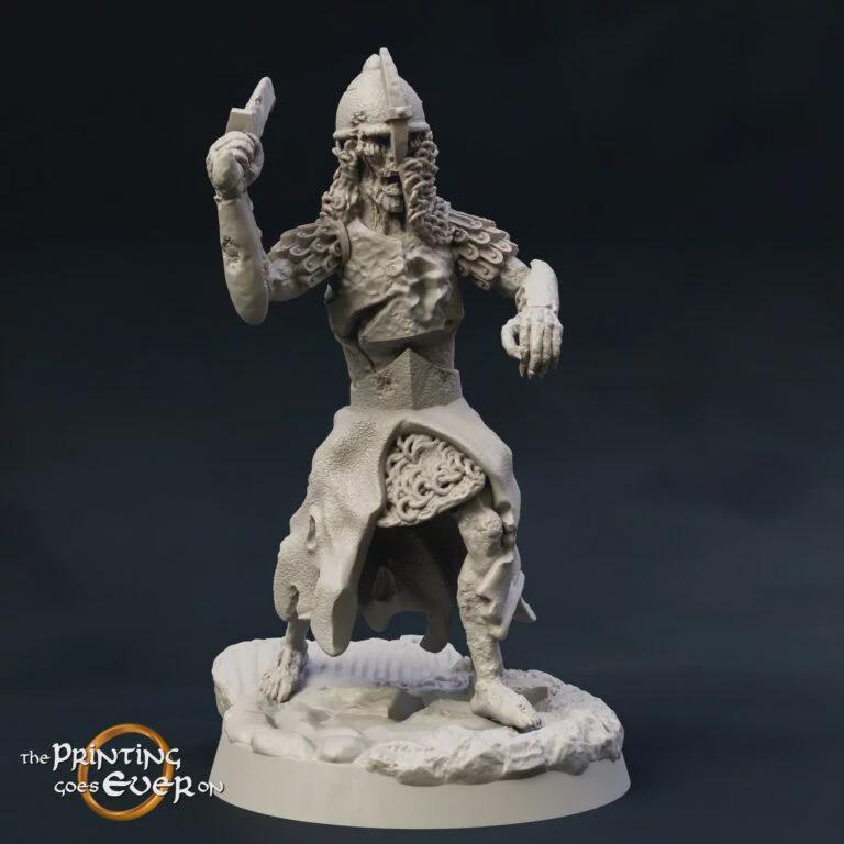 A detailed, sculpted statue of a warrior figure with a helmet and armor, holding a weapon in one hand and a shield in the other.