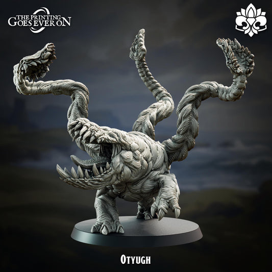 a large, intricate, and detailed figurine of a creature with multiple arms and sharp teeth, standing on a platform.