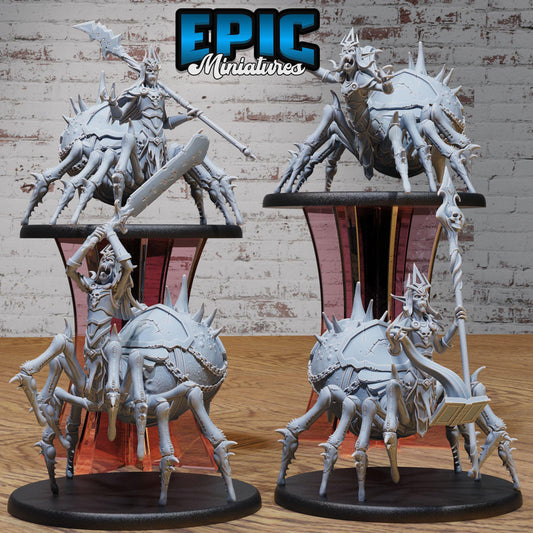 a collection of miniature figurines depicting various fantastical creatures, including large spider-like creatures and other mythical beings.