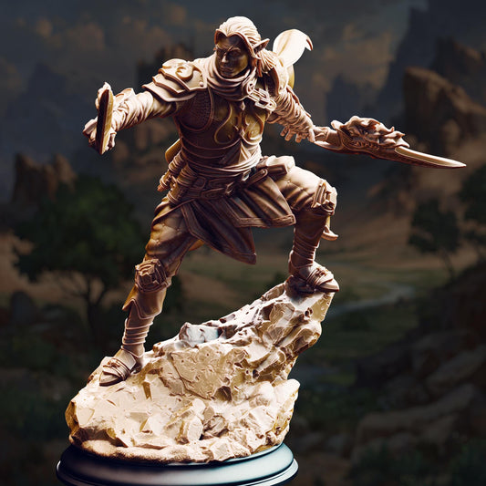 A bronze statue of a warrior figure standing on a rocky outcrop, holding a sword and shield, with a mountainous landscape in the background.
