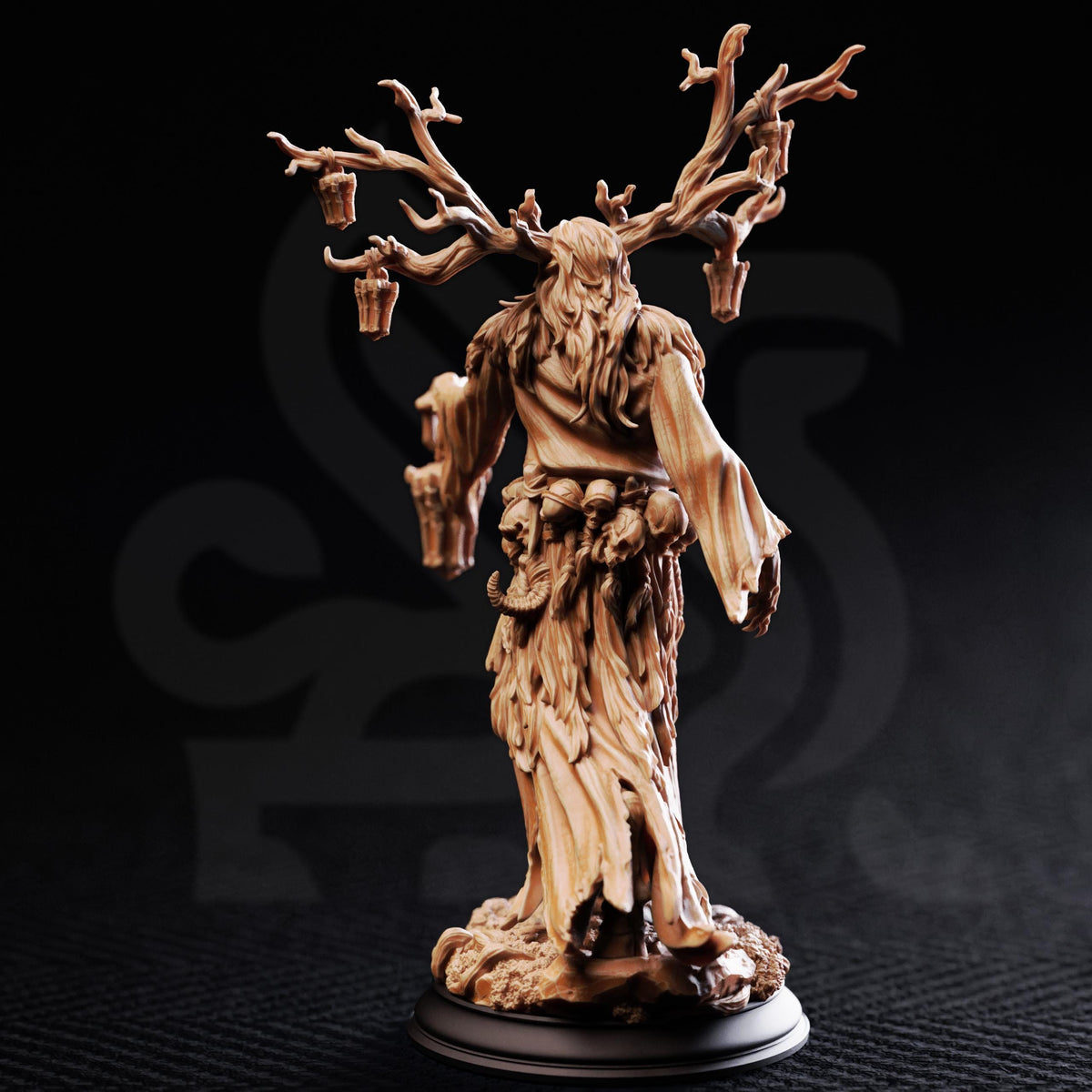 A detailed sculpture of a fantastical creature with a long, flowing robe and a headdress, standing on a base and holding a branch with a lantern.