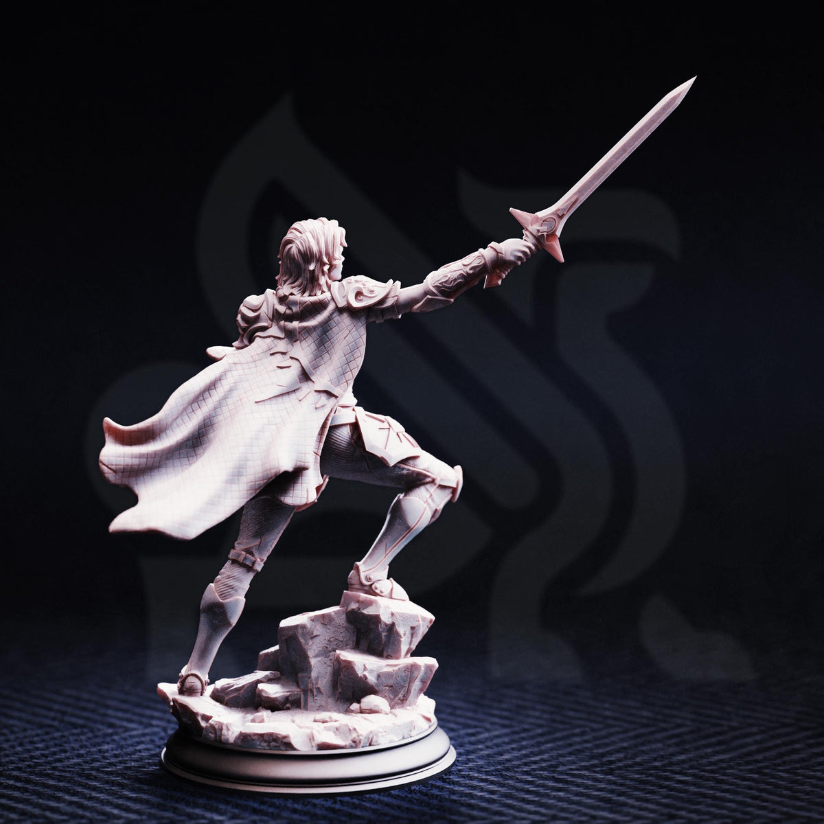 A figurine of a person holding a sword and standing on a rock formation against a dark background.