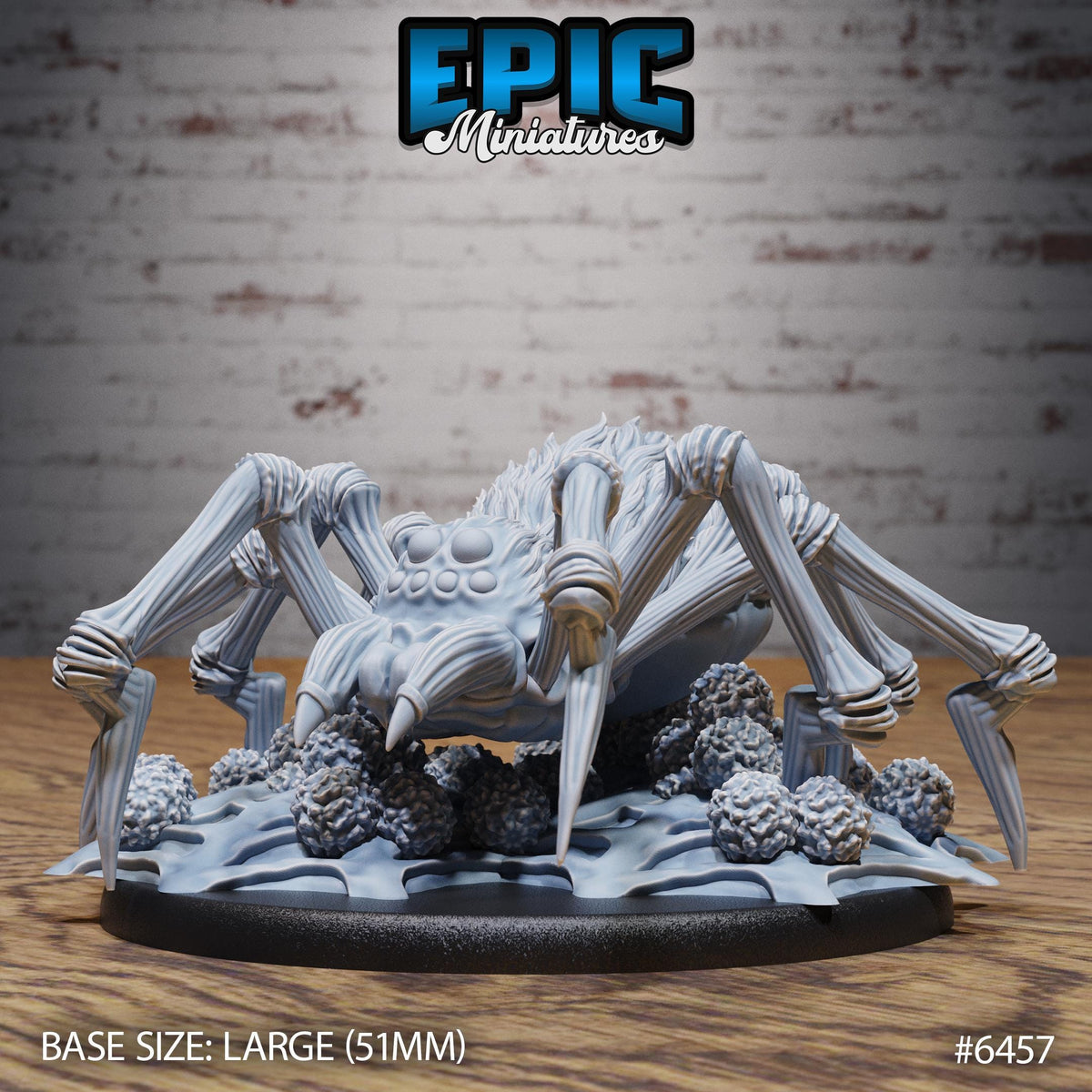 A 3D model of a large spider with eight legs, sitting on a base. The spider is depicted in a detailed and realistic manner, with its legs spread out and its body oriented towards the left side of the image. The background is a brick wall, providing a contrasting backdrop for the spider. The image is labeled with the text "BASE SIZE: LARGE (511mm)" and "#6457", indicating the size and identifier of the model.