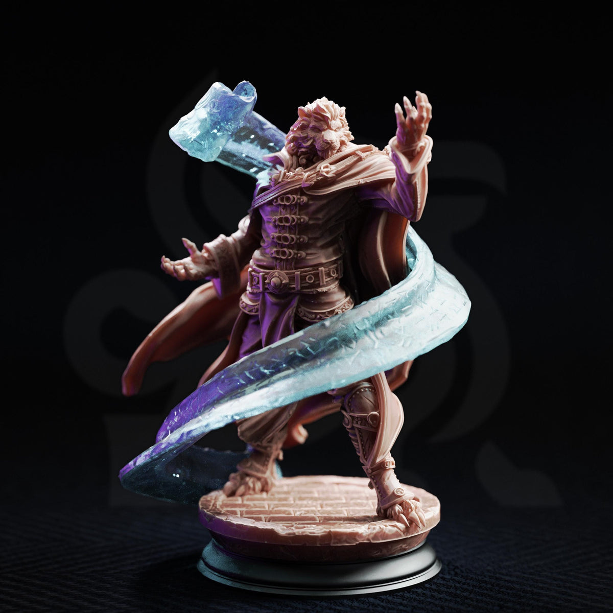A figurine of a man with a beard and a flowing cape, holding a blue object in his hand, standing on a platform against a dark background.