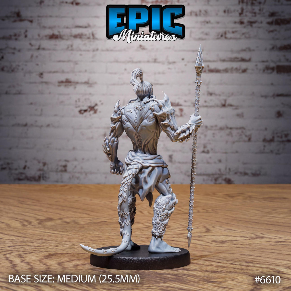 A figurine of a warrior-like character with a spear and a detailed design, standing on a wooden surface against a brick wall background.