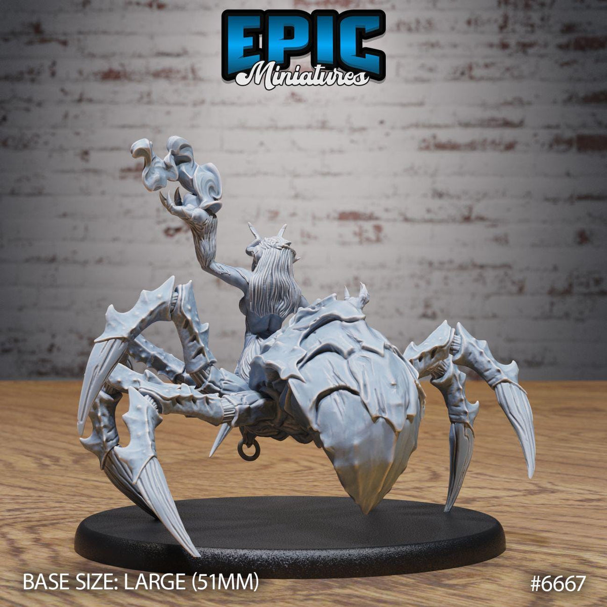 A large, detailed figurine of a spider-like creature with a human-like appearance, sitting on a black base.
