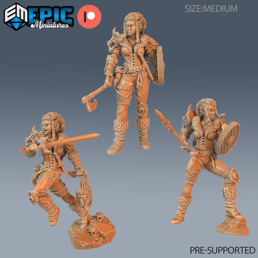 three detailed figurines of female fantasy characters, each holding various weapons and accessories, such as swords, spears, and shields. The figurines are arranged in a row, showcasing the different poses and stances of the characters.