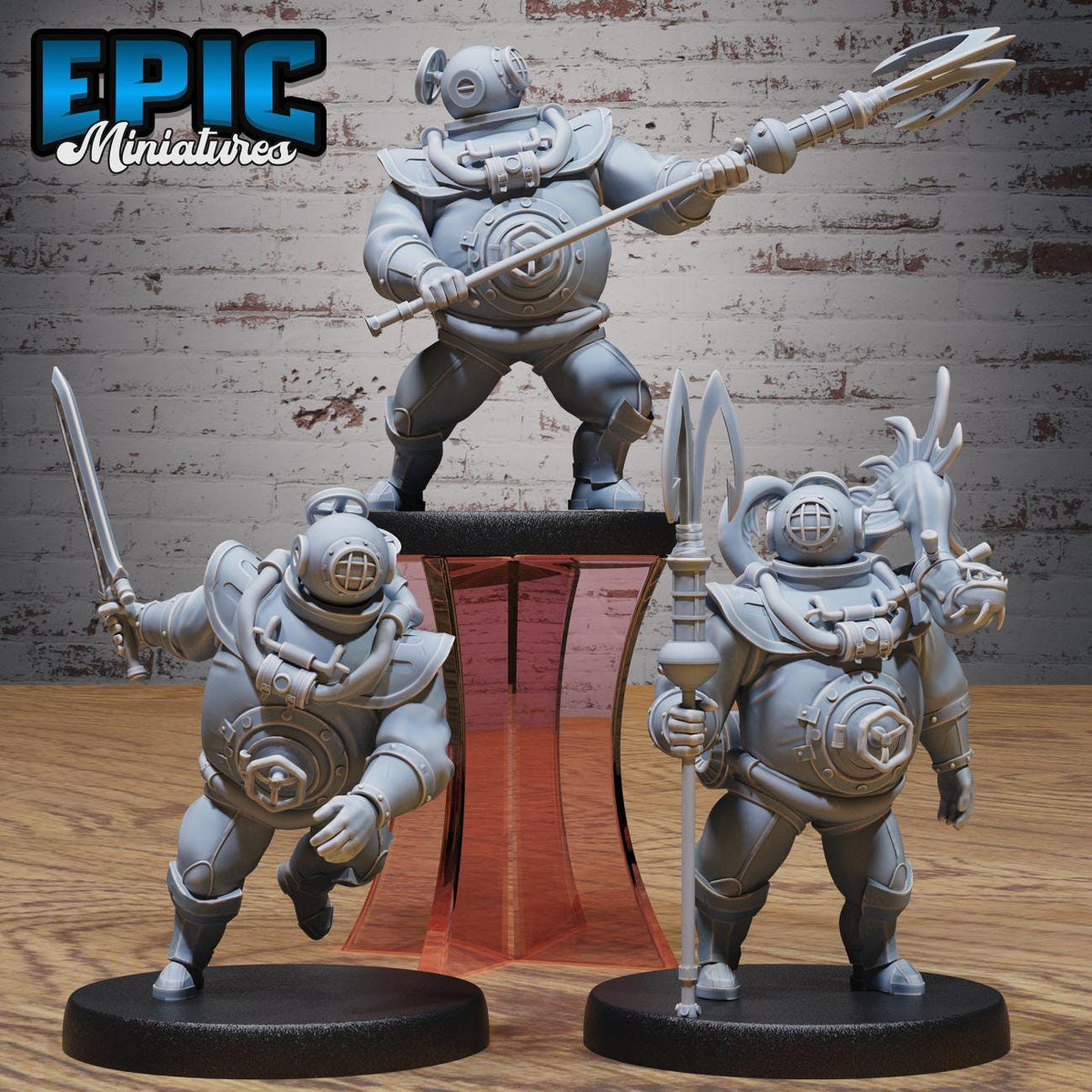 three figurines of underwater divers, each holding different weapons, such as swords and spears, and standing on platforms.