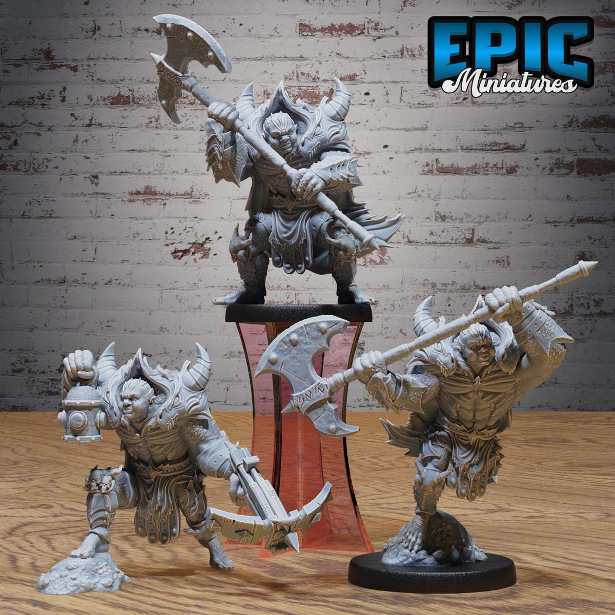 three detailed figurines of fierce-looking, armored characters, likely from a fantasy or action-adventure game.