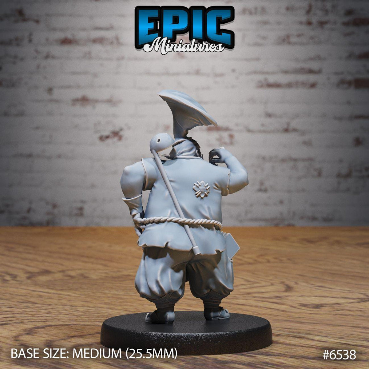 A figurine of a person in a white outfit, possibly a character from a video game, standing on a black base.