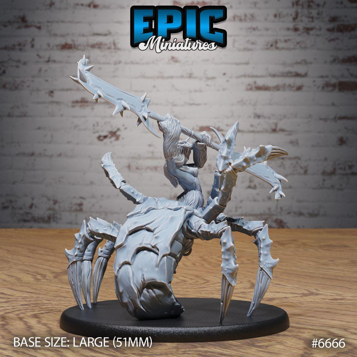 A large figurine of a spider-like creature with sharp claws and a human-like figure on its back, displayed on a black base.