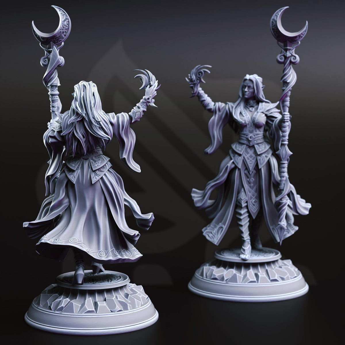 two detailed figurines of women, each holding a staff and a crescent moon, set against a dark background.