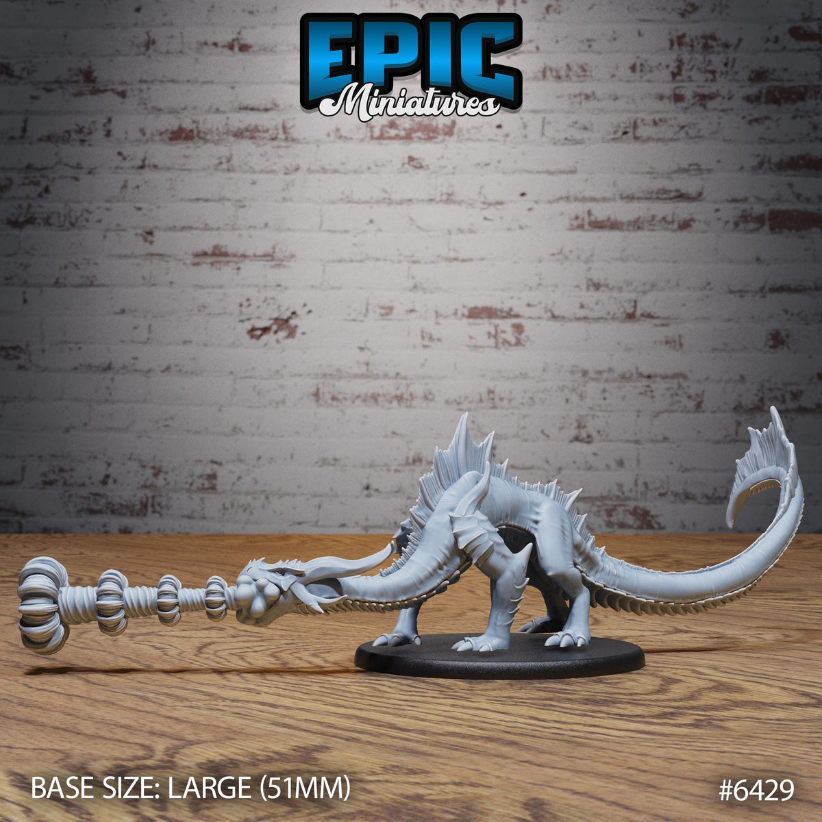 A large white dragon figurine is displayed on a wooden surface against a brick wall background.