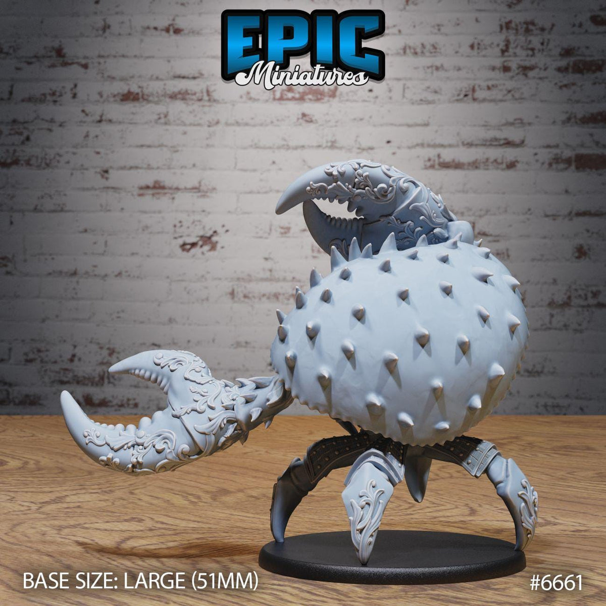 a large, detailed model of a crab-like creature with spikes on its body, sitting on a wooden surface.