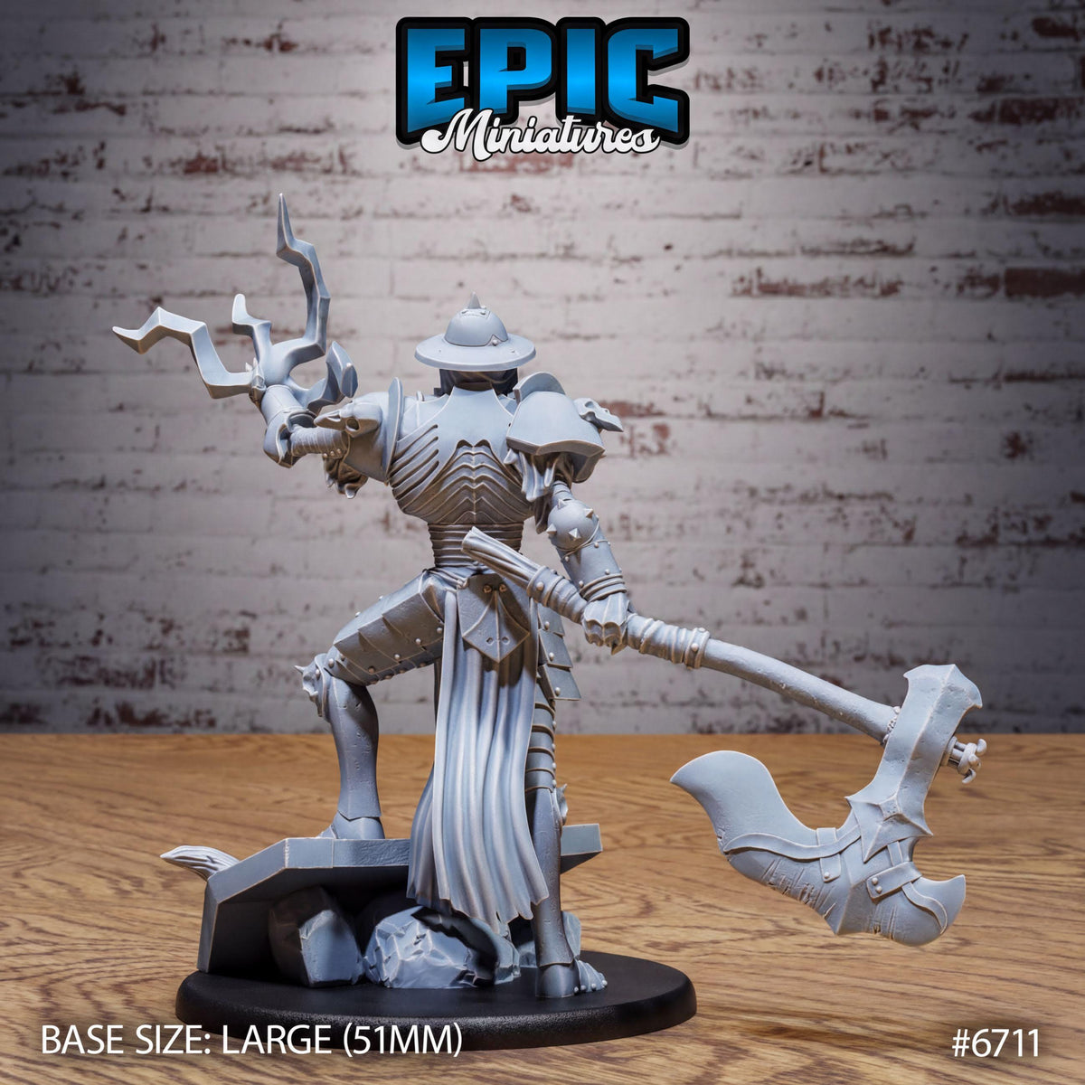 A large, detailed model of a warrior figure holding a large weapon, likely a sword or spear, with a brick wall in the background.