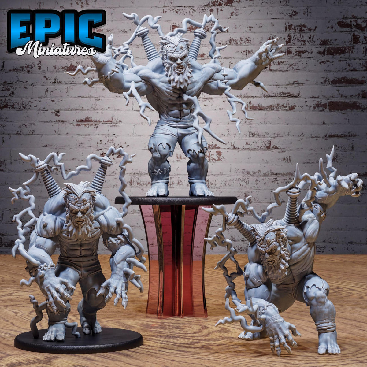 three large, imposing, and fantastical figurines with intricate details and dynamic poses, set against a brick wall backdrop.