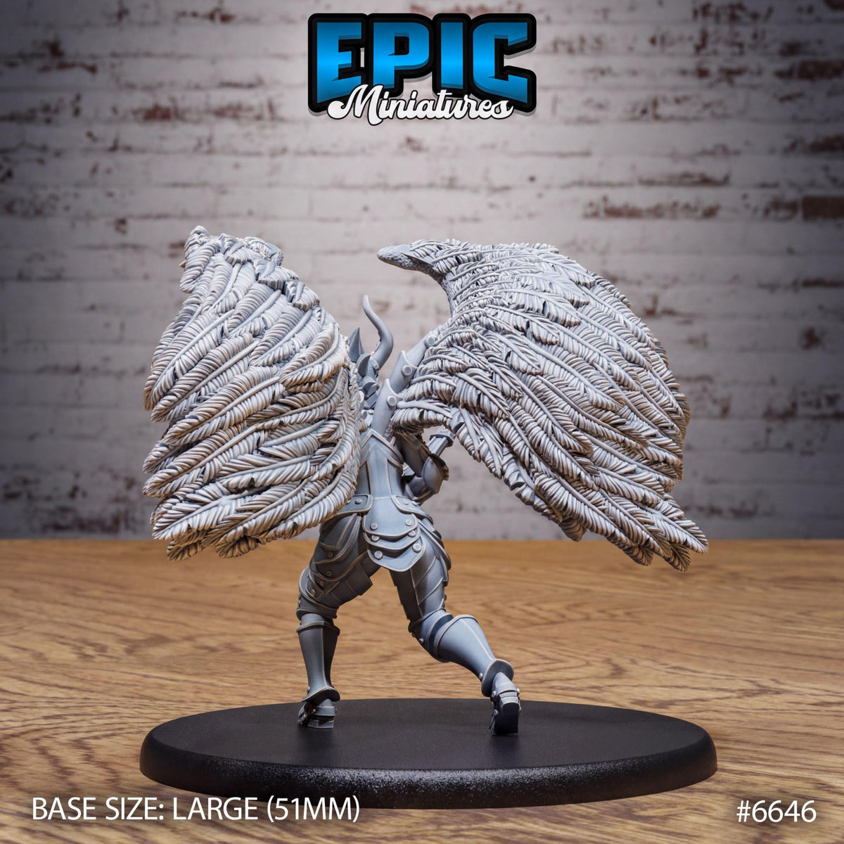 A figurine of a winged warrior standing on a black base, with a brick wall in the background.