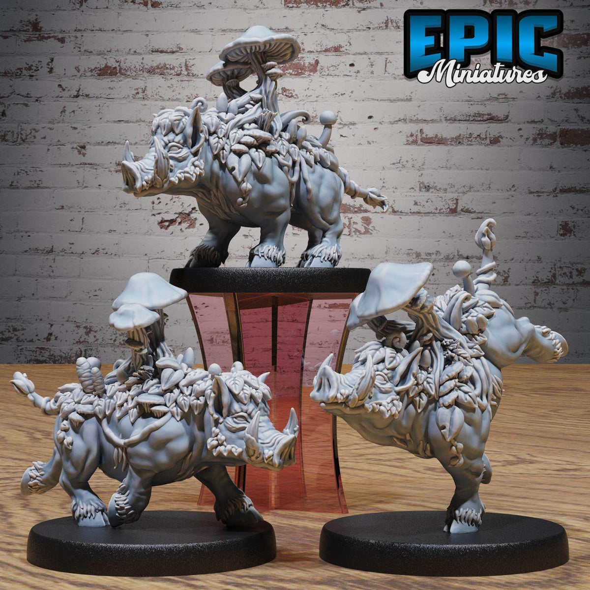 three intricately designed figurines of fantastical creatures, including mushrooms, horses, and other fantastical elements, displayed on black bases against a brick wall background.