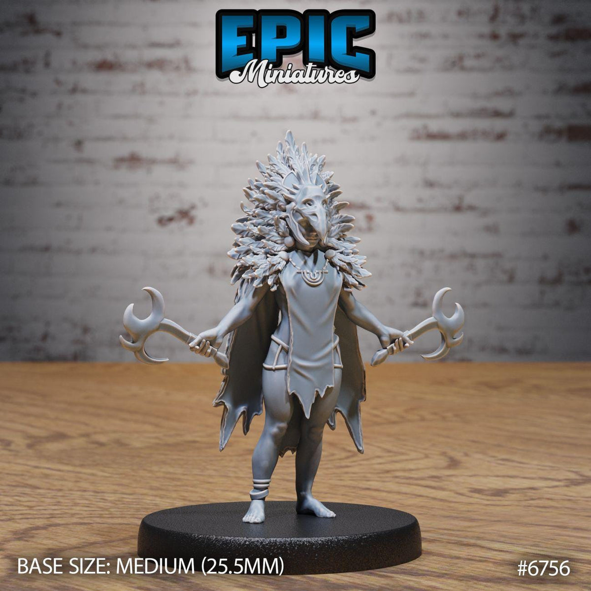 A figurine of a person with a large headdress and a long, flowing cape, standing on a black base.