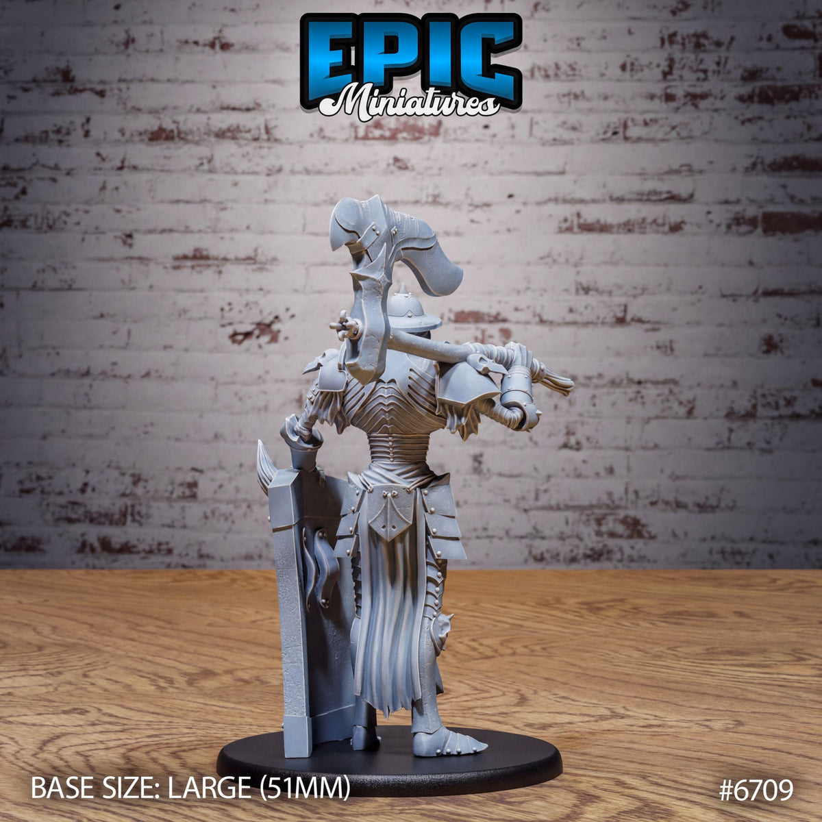A figurine of a knight in armor, standing on a wooden surface against a brick wall background. The figurine is described as a "large" or "base size" (5.1mm) and is labeled as a "miniatures" product.