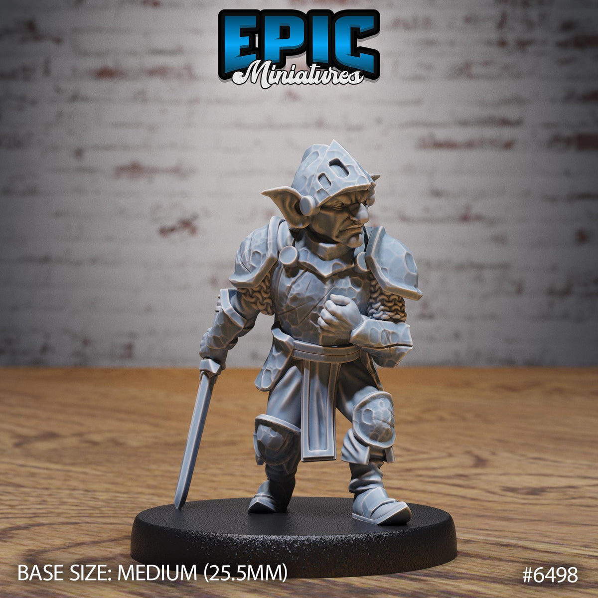 A figurine of a knight in armor, standing on a base and holding a sword.