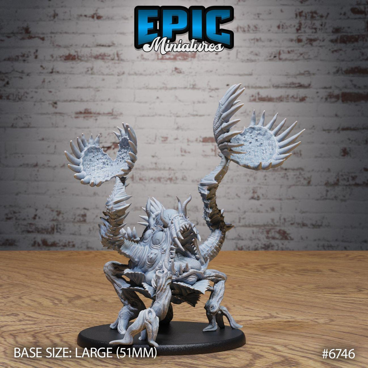 a large figurine of a creature with multiple arms and legs, sitting on a wooden surface against a brick wall background.