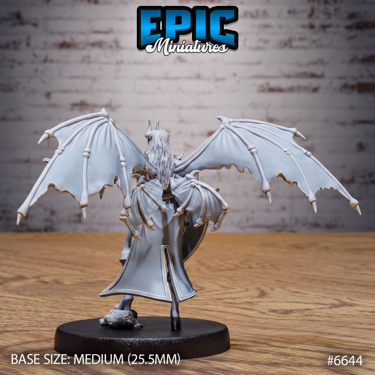 A figurine of a winged creature with a long tail, standing on a black base. The figurine appears to be a miniature model of a fantastical creature, possibly a dragon or a mythical being. The background is a brick wall, which adds to the overall aesthetic of the image. The figurine is described as a "MEDIUM" size, which suggests that it is not a large-scale model but rather a smaller, more detailed representation of the creature.