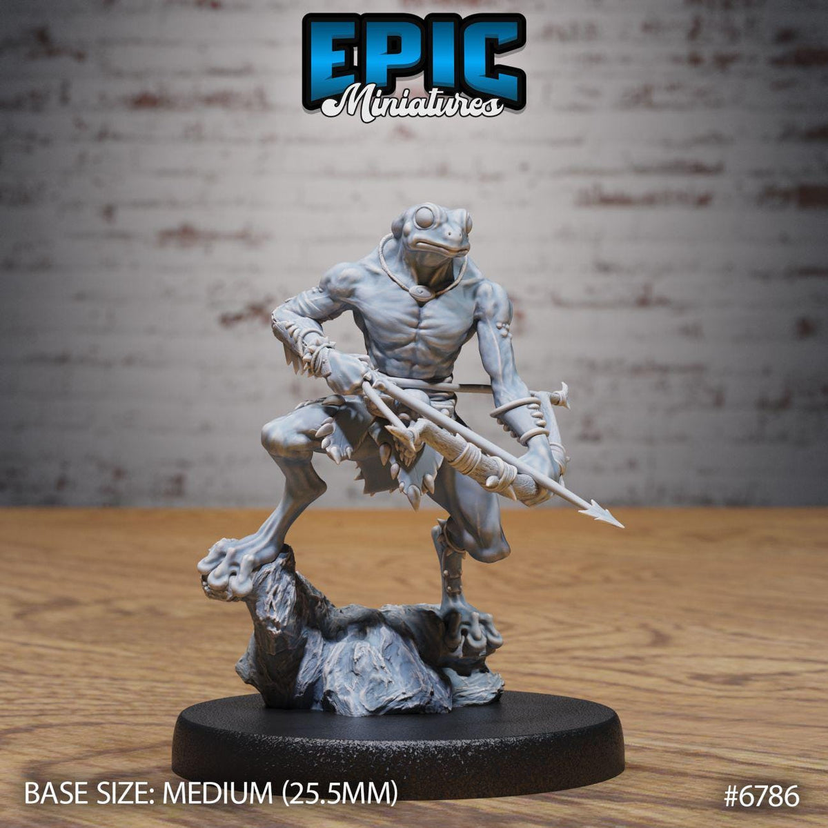 A figurine of a frog-like creature holding a weapon, standing on a rock formation.