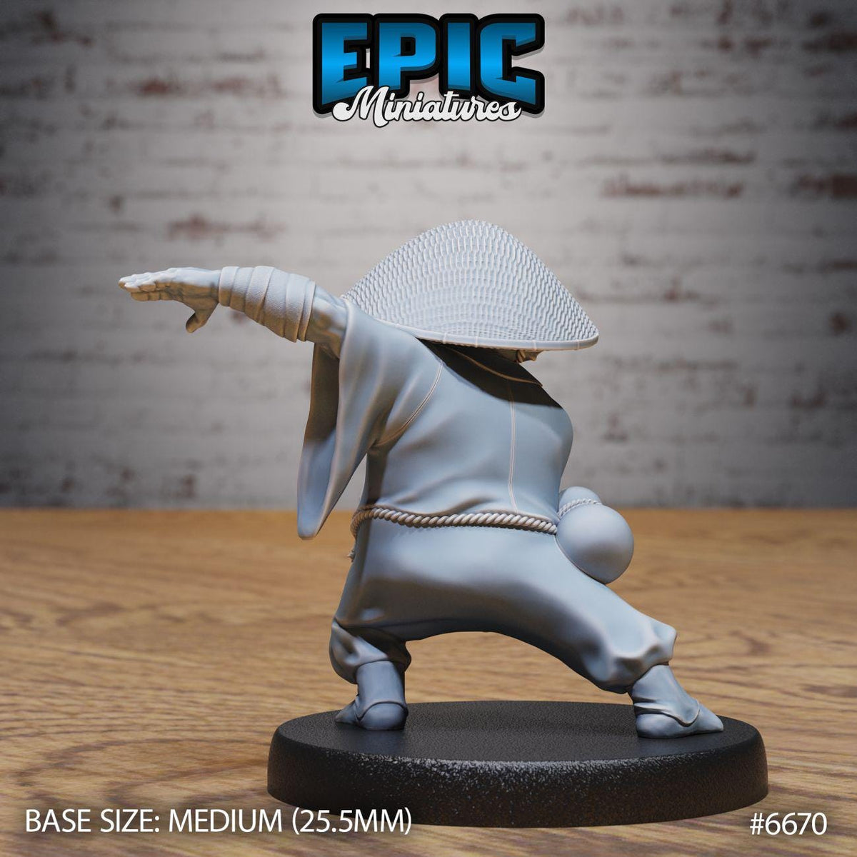 A figurine of a person in a white outfit and hat, with one arm extended, standing on a black base.