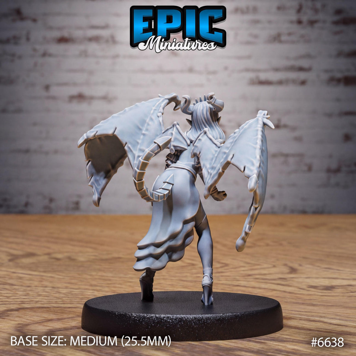 A figurine of a winged, winged creature with horns and a flowing skirt, standing on a black base.