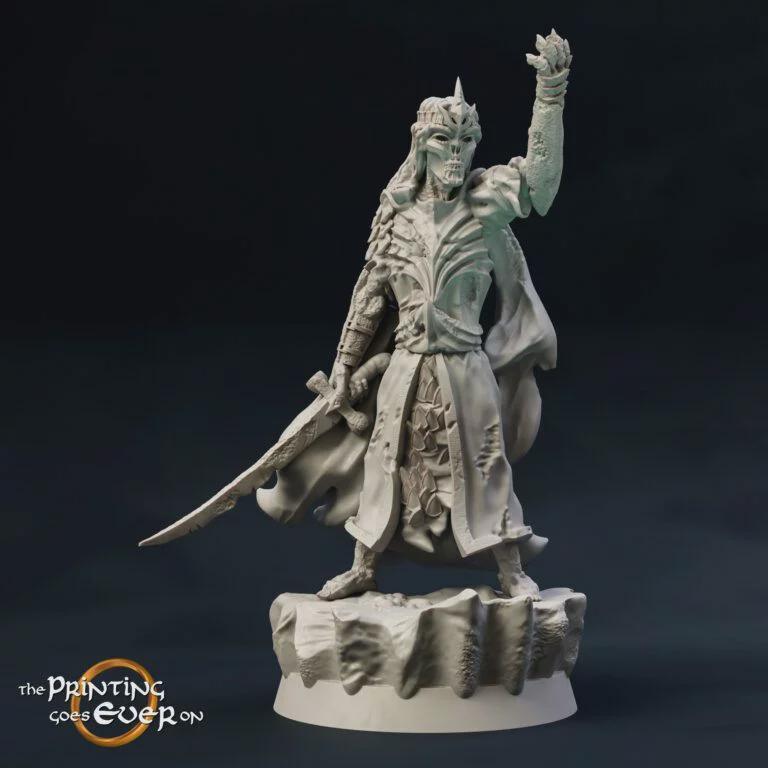A detailed figurine of a warrior standing on a rock, holding a sword and wearing a crown-like headdress.