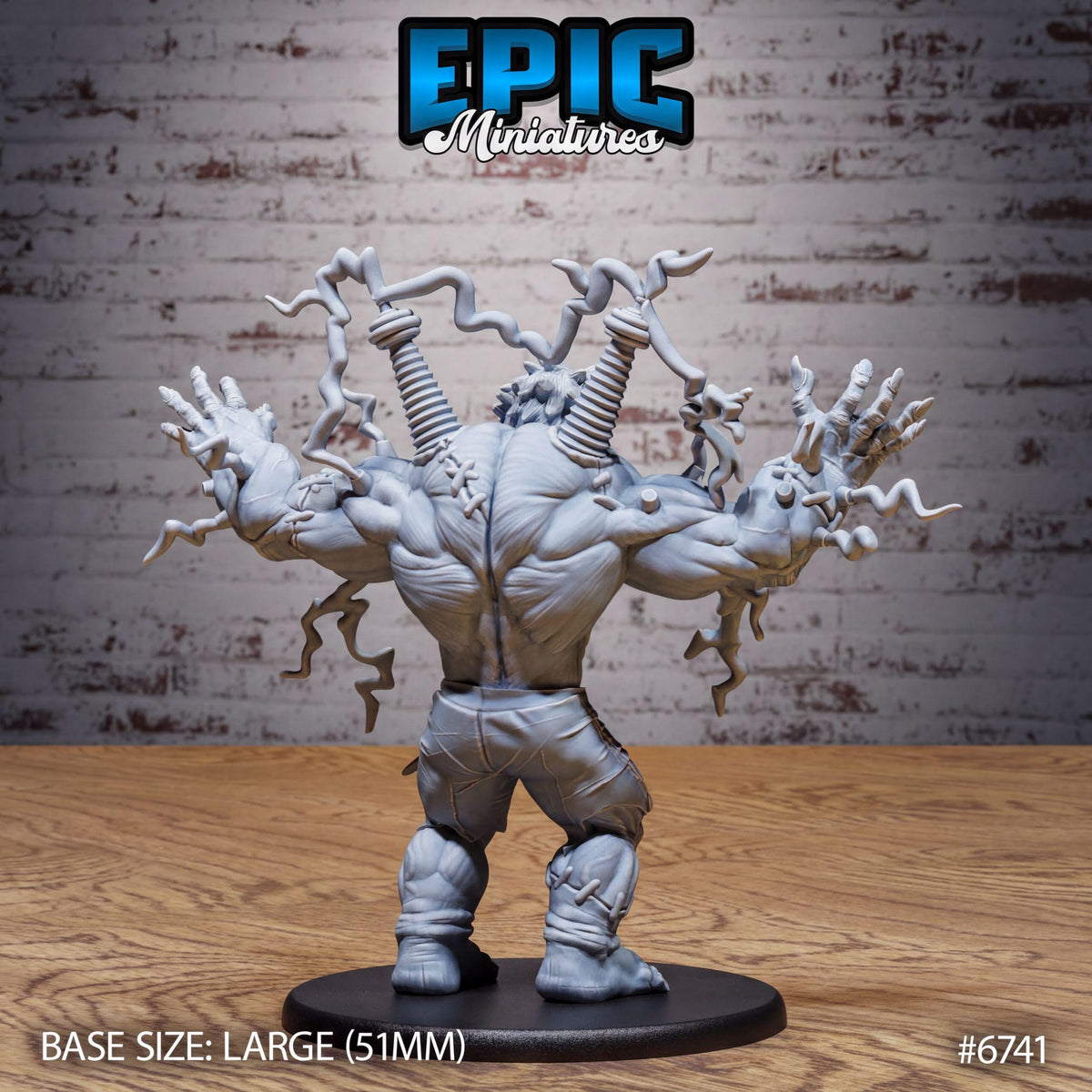A large statue of a muscular, battle-ready figure with a twisted, lightning-like appearance, standing on a black base.