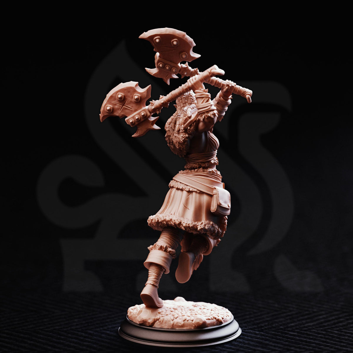 A figurine of a warrior figure, holding a sword and shield, standing on a base against a dark background.