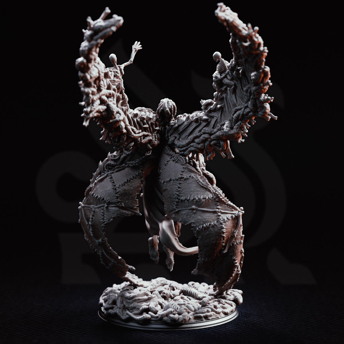 A detailed, intricate figurine of a winged creature with a complex, organic design.