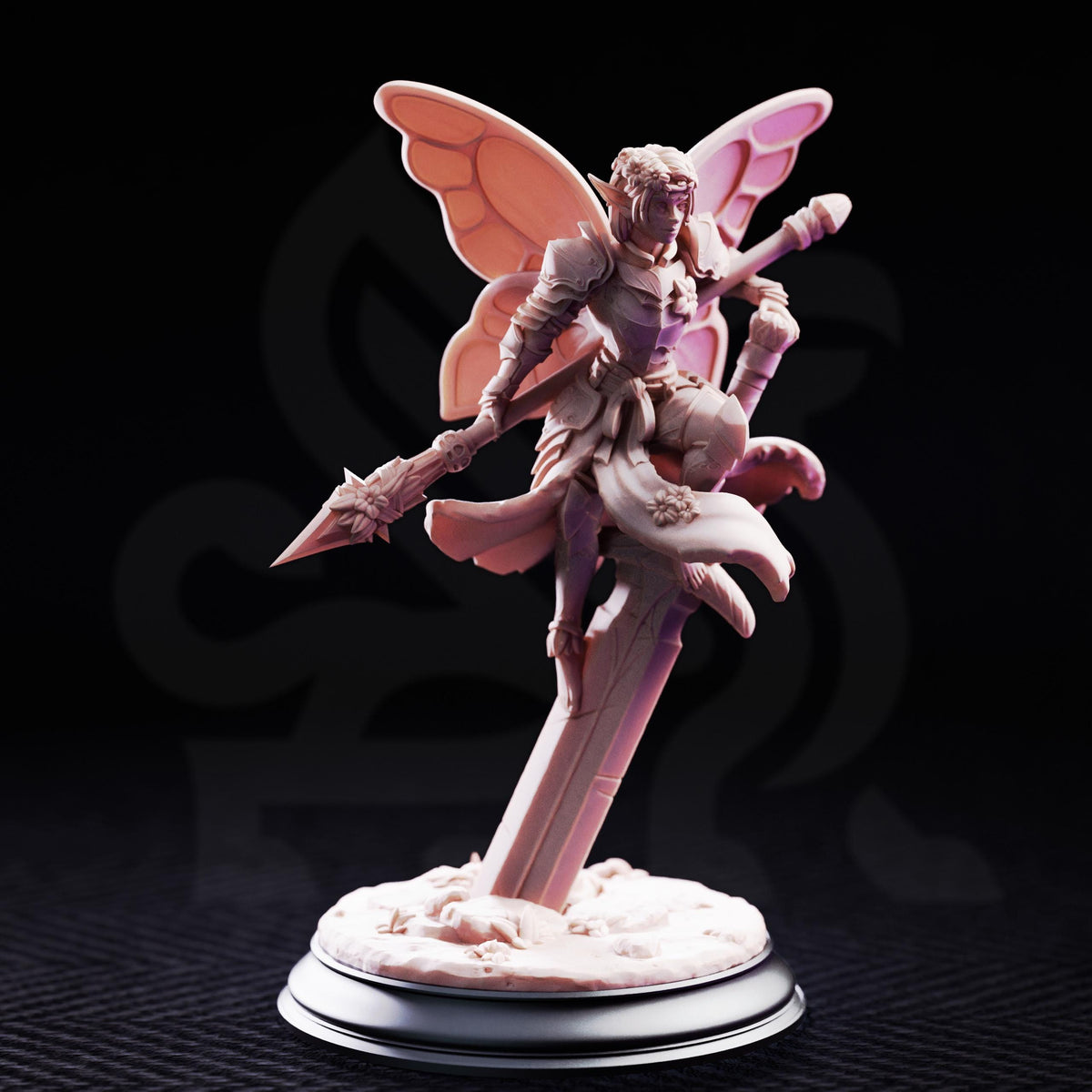 A figurine of a winged, armored figure holding a weapon and standing on a pedestal against a dark background.