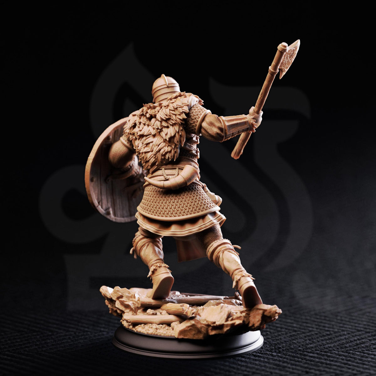A figurine of a warrior holding a shield and an axe, standing on a base against a dark background.