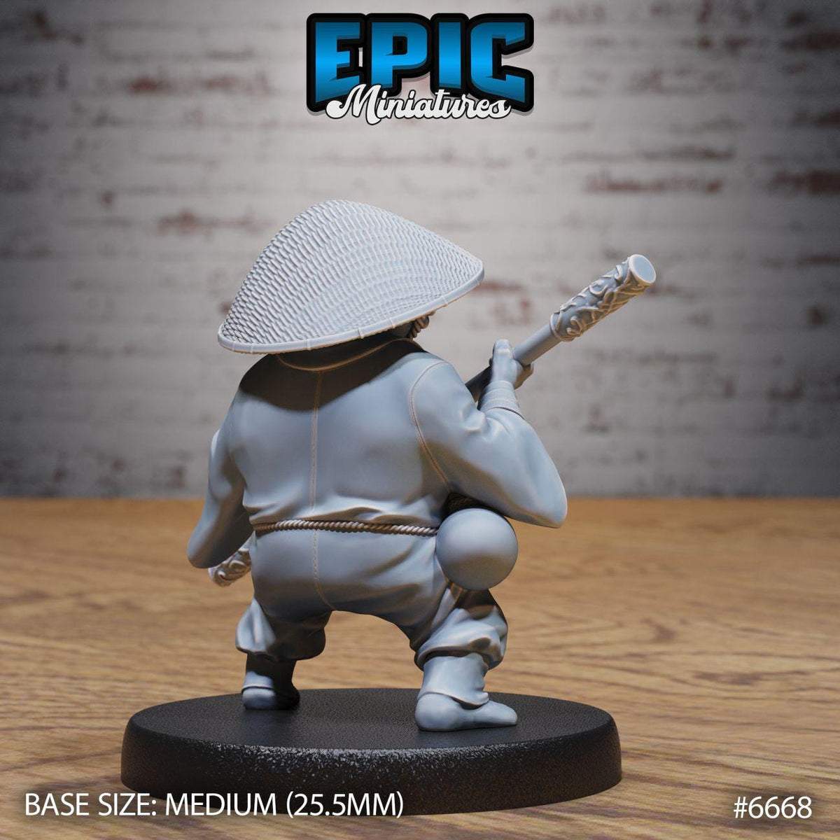 A figurine of a person in a hat and holding a baseball bat, sitting on a black base.
