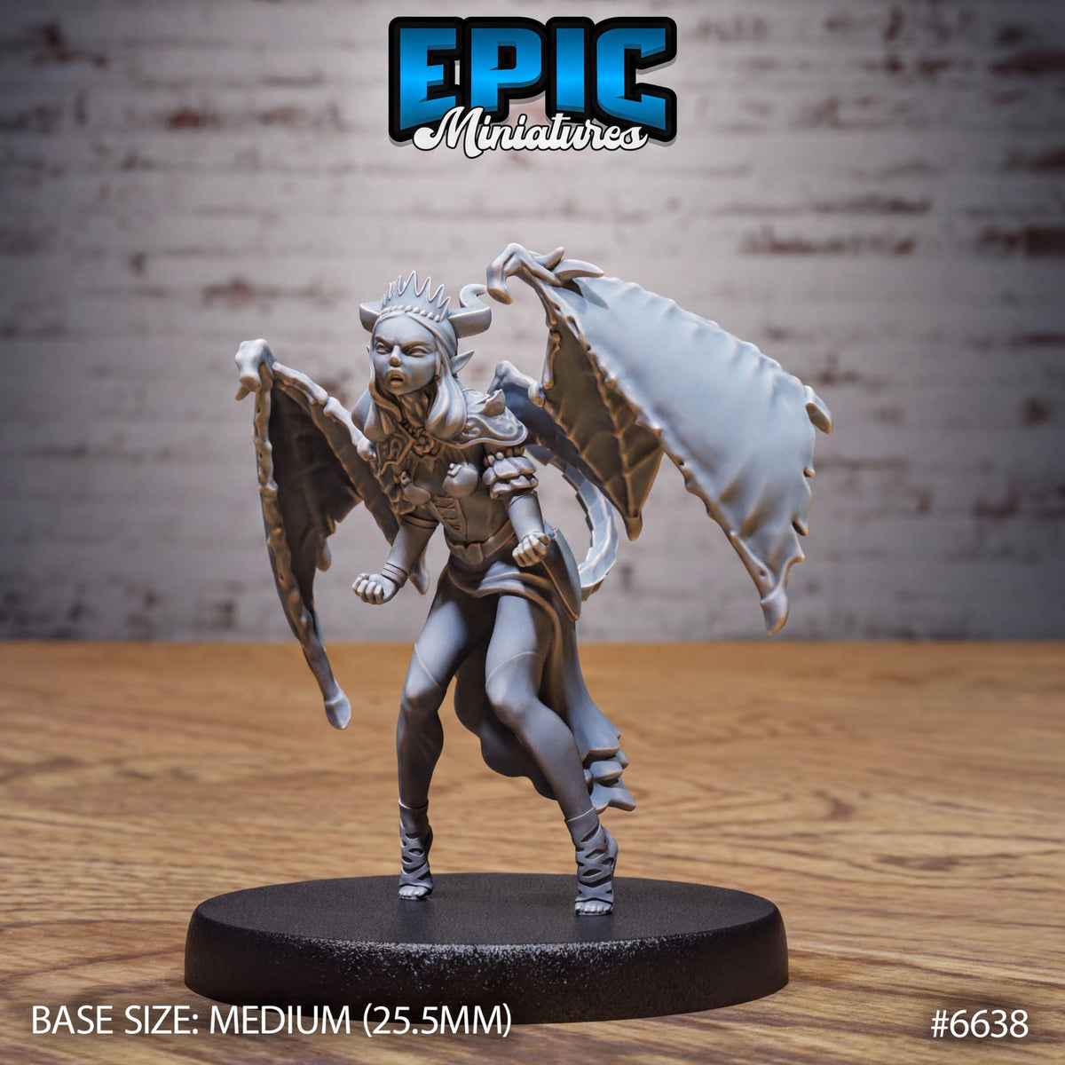 A figurine of a winged female character with a fierce expression, standing on a black base.