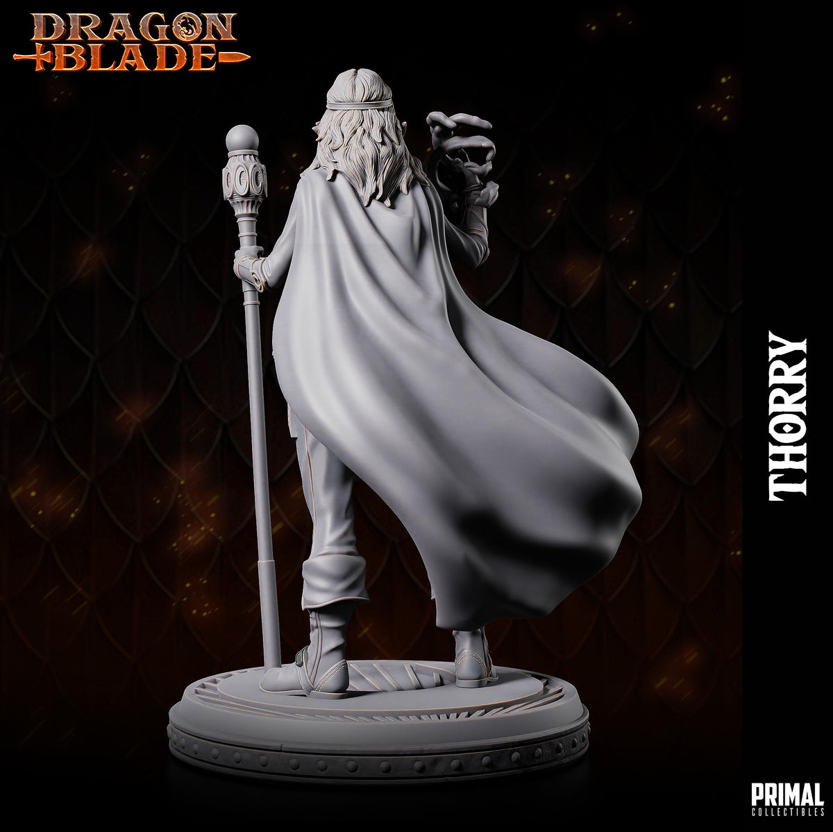 A statue of a person with long hair and a flowing cape, holding a staff and standing on a platform.