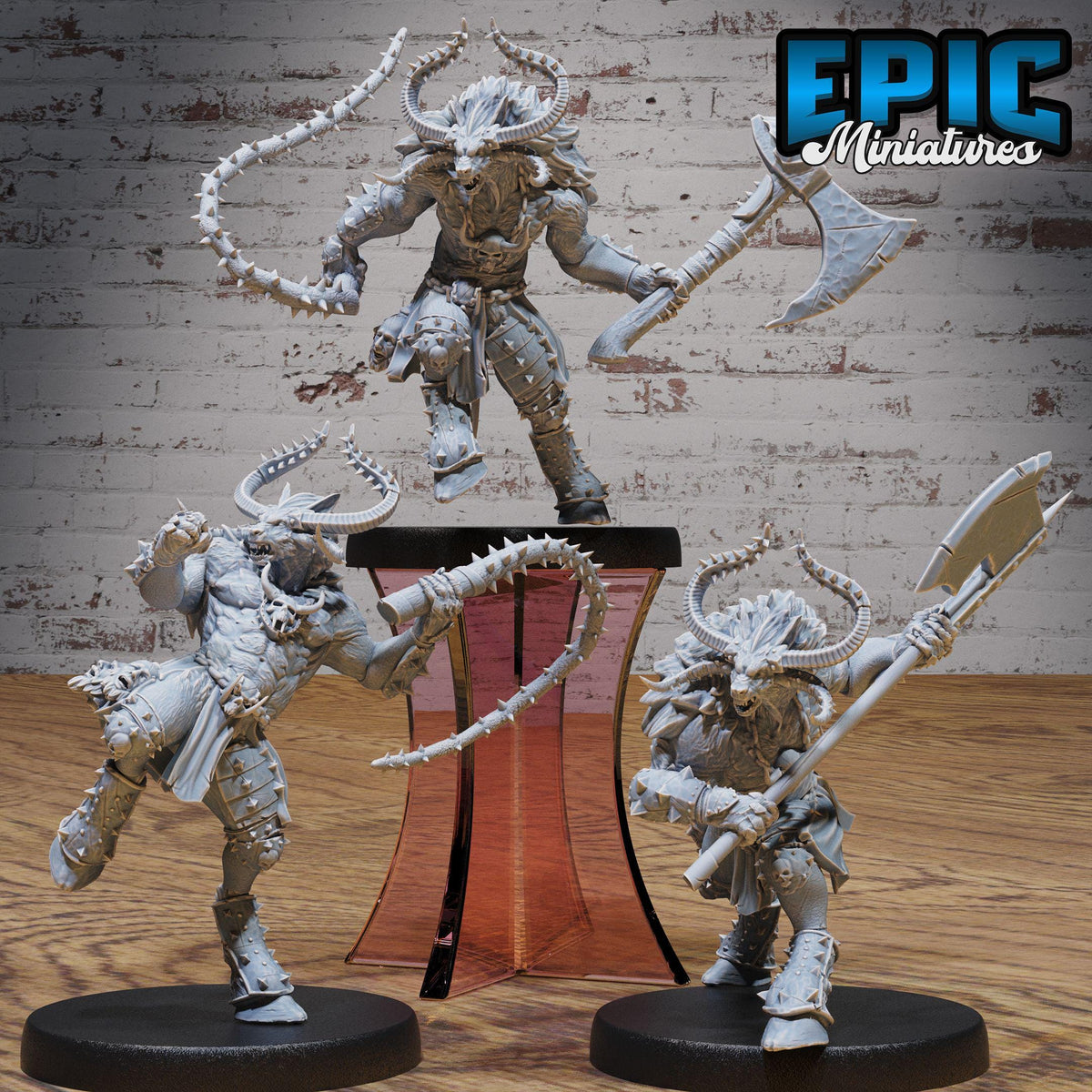 three detailed figurines of fierce-looking creatures, possibly mythical or fantasy-inspired, posed in various dynamic poses.