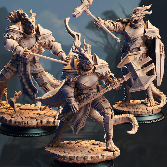 three detailed figurines of dragon-like creatures, each holding various weapons and standing on platforms.