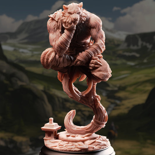 A detailed sculpture of a fantastical creature, possibly a dragon or wolf, sitting on a branch and holding a small object in its mouth. The sculpture is set against a backdrop of mountains and a cloudy sky.