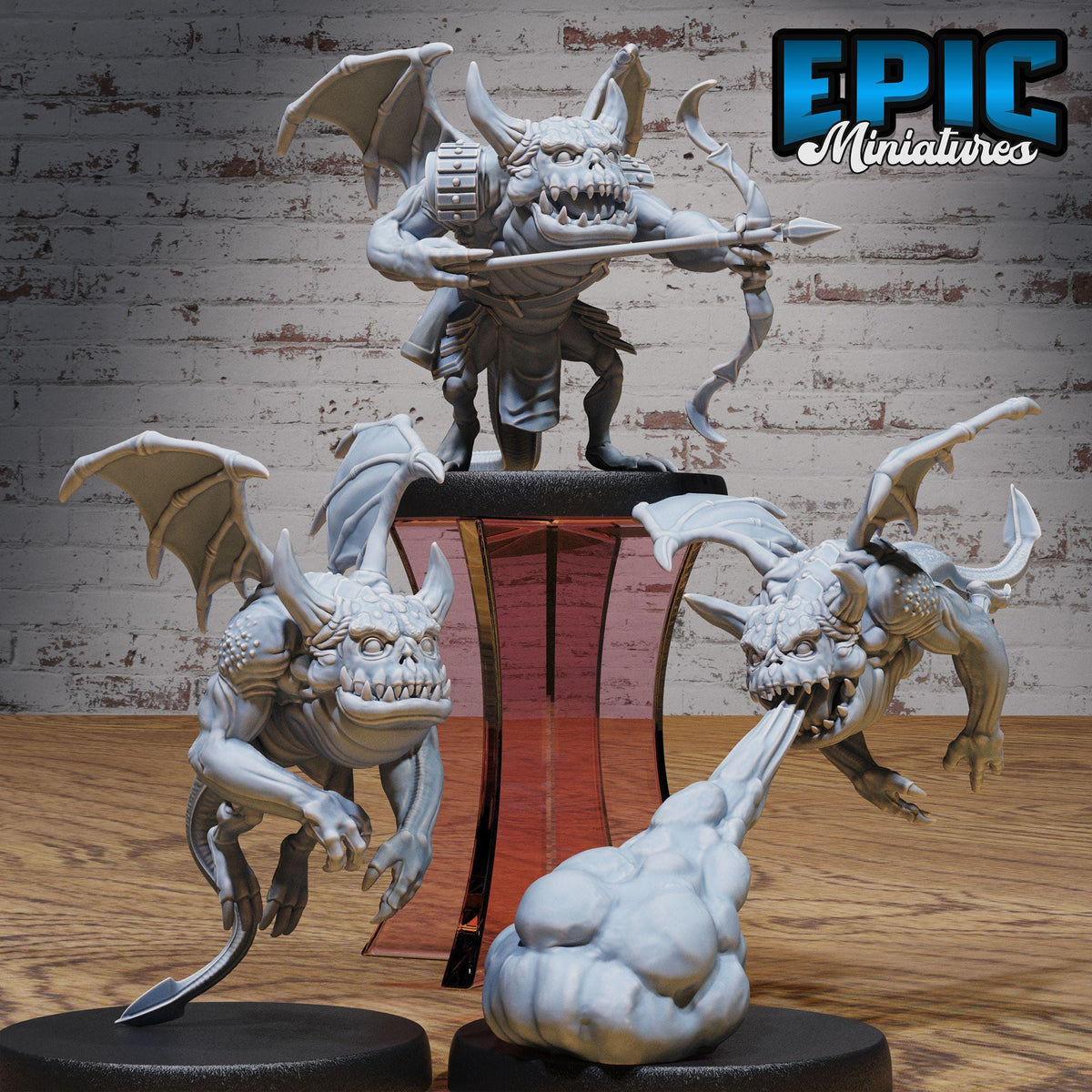 three detailed, miniature figurines of fantastical creatures, including winged, armored, and armored creatures, set against a brick wall background.