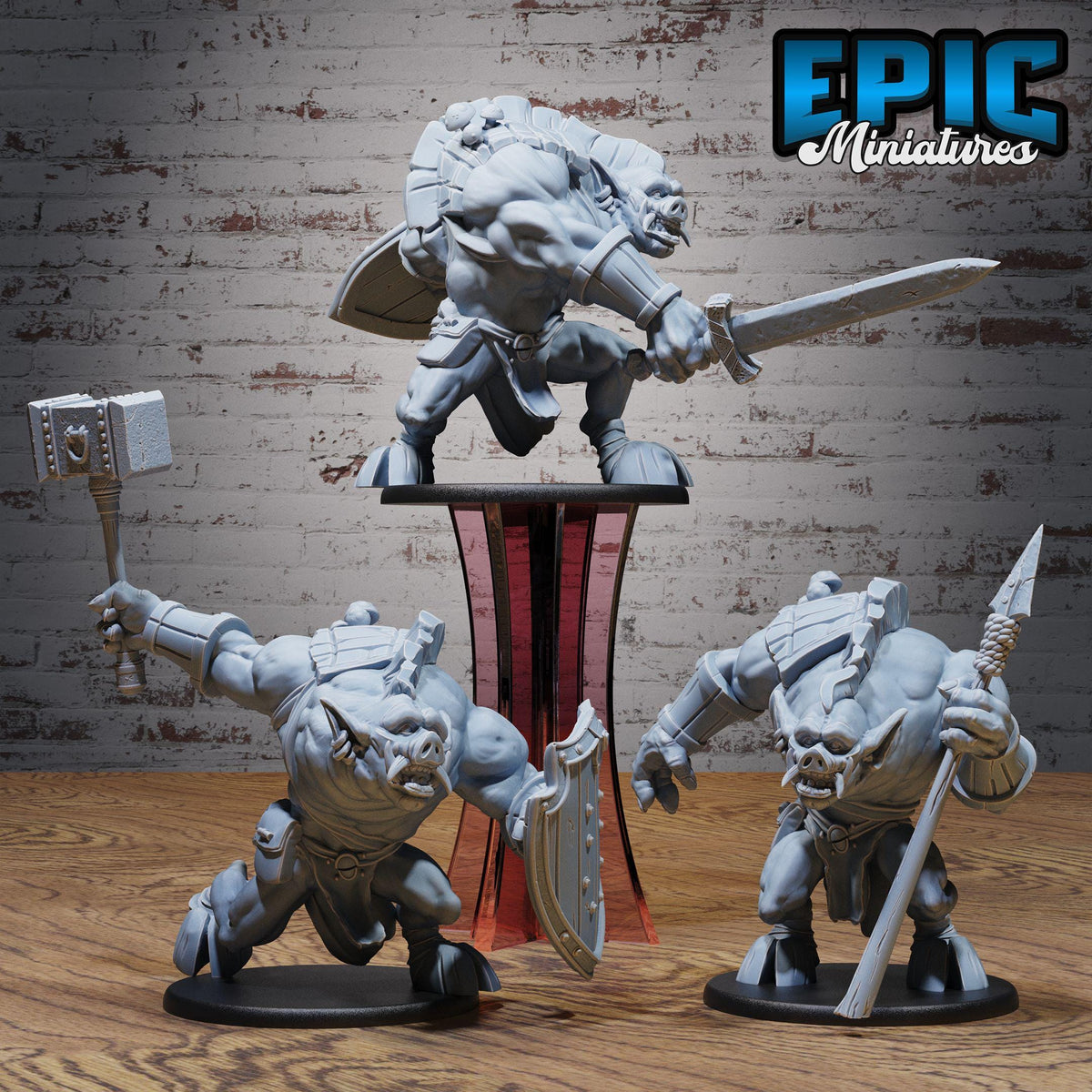 three miniature figurines of fierce-looking creatures, likely representing a fantasy or action-adventure theme.
